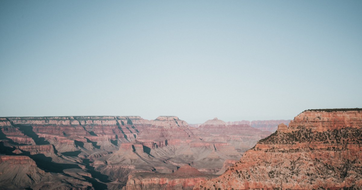 The rim of a canyon at sunset: drawdown is the distance between the highest point the account reached and the lowest point that comes after